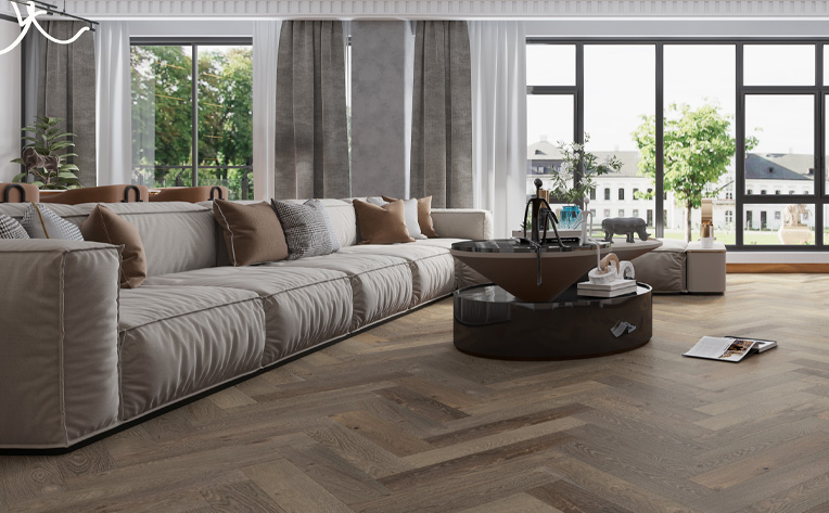 herringbone hardwood flooring in living room with contemporary decor